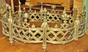A large eight light 19th century ecclesiastical / gothic brass chandelier, with stylised floral