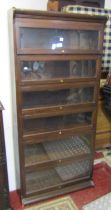 Globe Wernicke style floor standing library bookcase with hinged rectangular glazed panelled