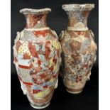 A pair of early 20th century Japanese oviform vases with character, landscape and other detail, 40