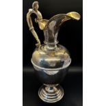 A late Victorian silver claret jug with a scrolled female handle, London 1901 maker George fox, 30cm