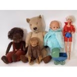A mixed lot of vintage toys including a Chiltern type teddy bear with stitched nose and replaced paw