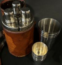A vintage leather triple flask holder, with a working zip and original shoulder strap, together with