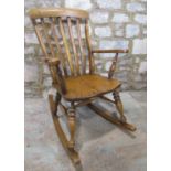 A Windsor lathe back rocking chair, principally in ashwood
