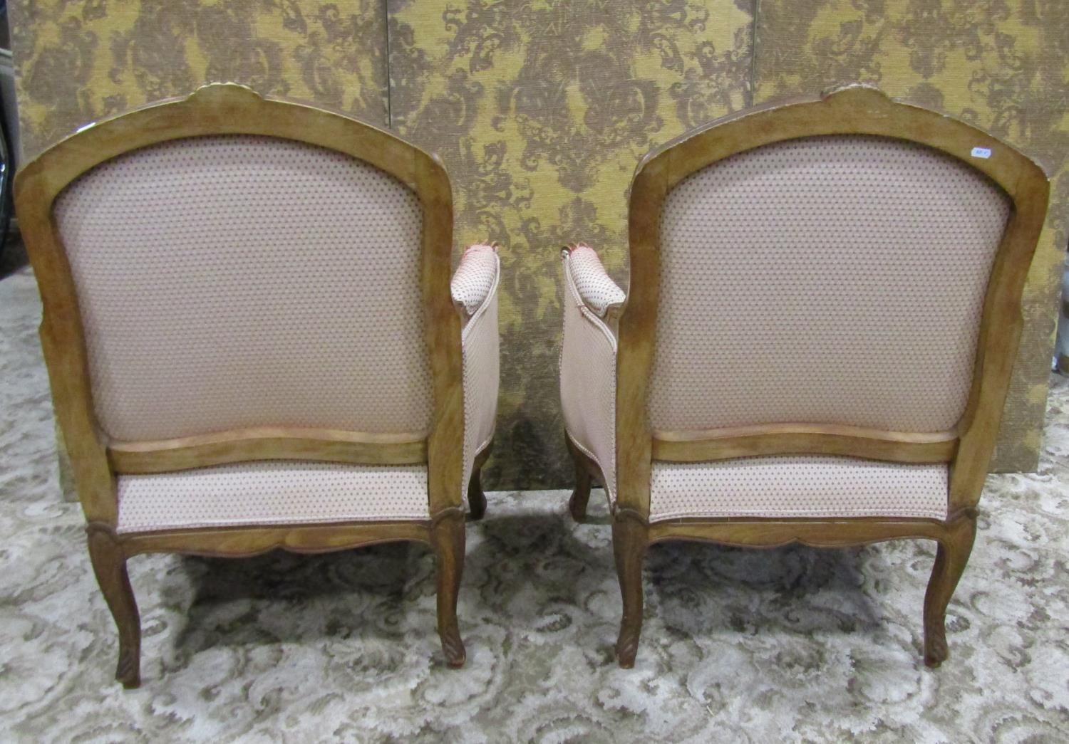 A pair of upholstered armchairs with carved show wood frames on cabriole supports - Image 5 of 9