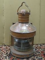 A copper mast head nautical lantern manufactured by Buyers Regency Quay Aberdeen ,with original
