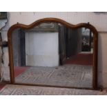 19th century overmantle mirror the top of serpentine form set in a moulded frame, 109cm x 135cm