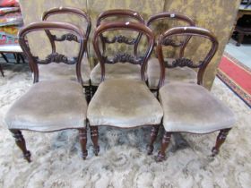 Set of six Victorian mahogany dining chairs with upholstered seats on turned supports