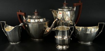A Mappin & Webb silver four piece tea service, Sheffield 931, together with a single cream jug, 42oz