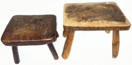 An antique rustic footstool in oak and one other (2)
