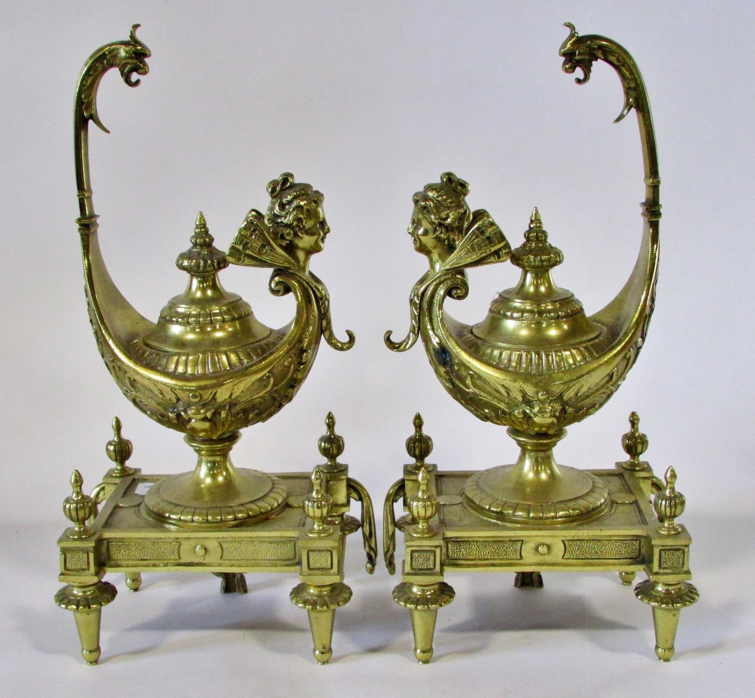 A large pair of 19th century brass dummy oil lamps (possibly ex-monumental fire side fender) in