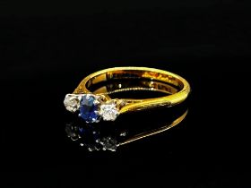 Early 20th century 18ct claw set sapphire and diamond three stone ring with platinum setting, size