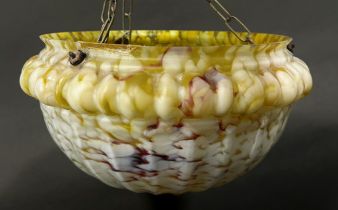 An early 20th century marbled “jelly mould” glass light shade with three hanging chains, 30cm