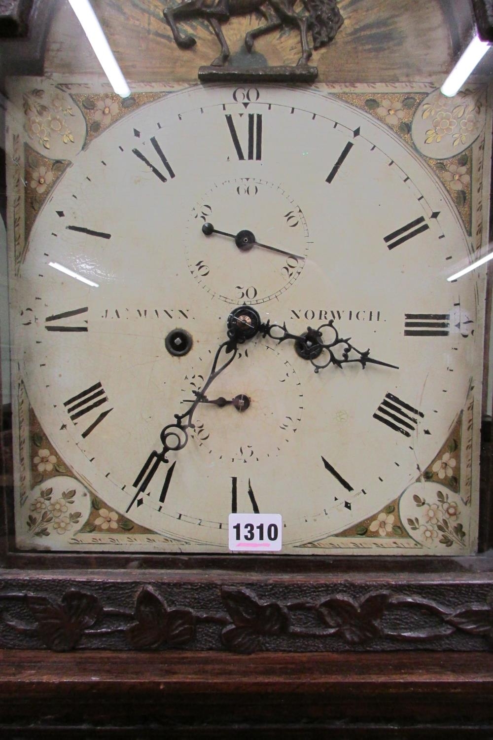 A 19th century oak longcase clock with heavy estate carving, the trunk detailing a knight fighting - Image 4 of 17