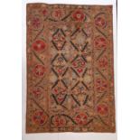 19th century Uzbek Suzani panel created from 4 sections embroidered in silk chain stitch on dark