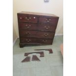 A Georgian mahogany chest of three long and two short drawers crossbanded in satin wood and with