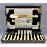 A cased set of fish cutlery, a cased set of butter knives, a further fish set of cutlery, together
