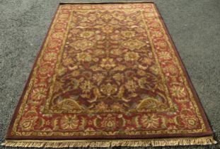 An Indian Jaipur carpet with an all over floral pattern, 252cm x 160cm