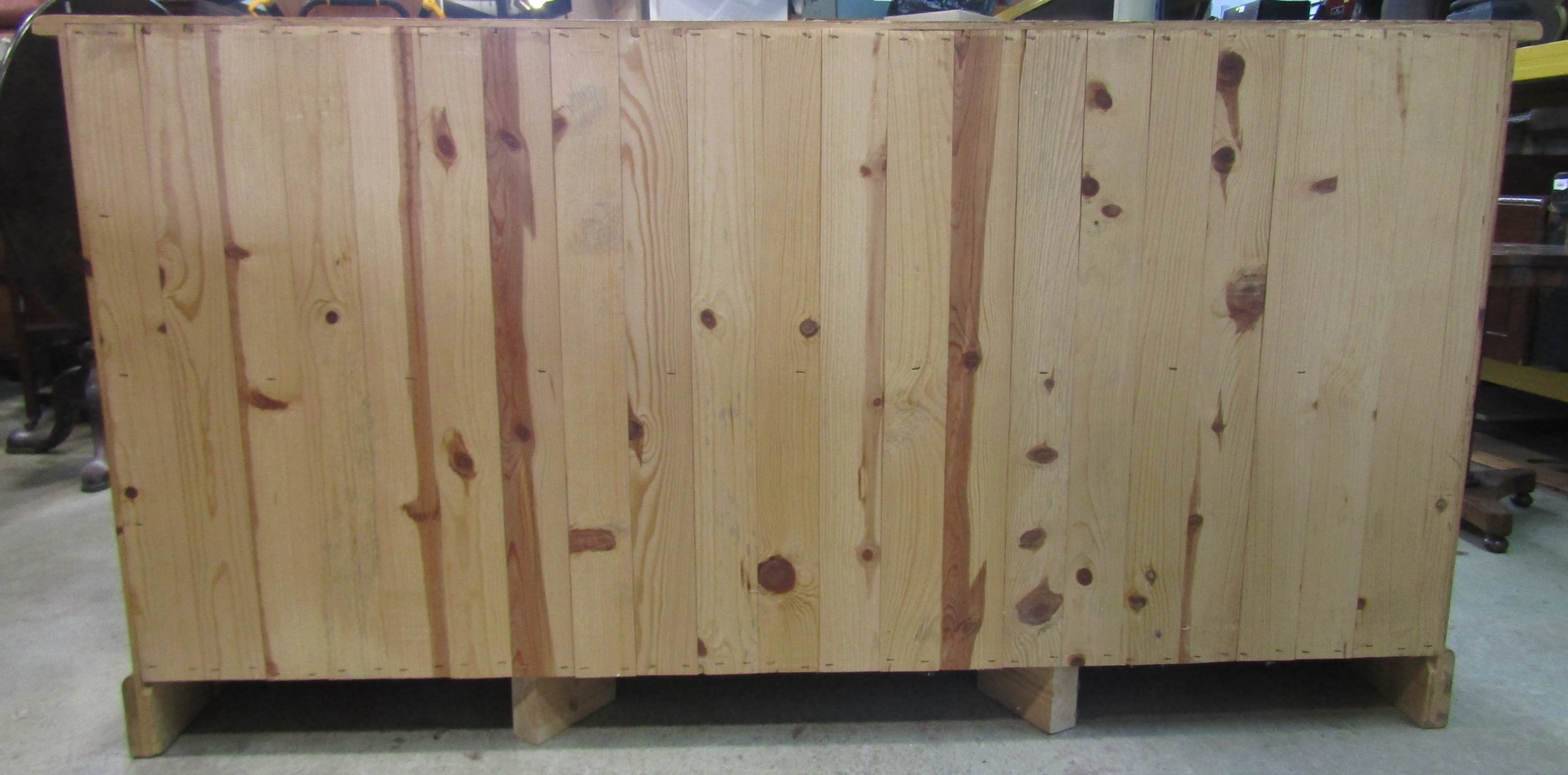 A traditional pine cabinet containing a series of 19 drawers, 180cm long x 93cm high x 48cm deep - Image 2 of 3