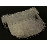 A Middle Eastern silver metal “chain mail” draw string money bag, 9.5 oz approx.