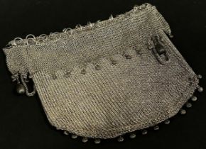 A Middle Eastern silver metal “chain mail” draw string money bag, 9.5 oz approx.