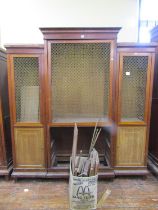 19th century mahogany breakfront three sectional cupboard with geometric brass grilled doors, fitted