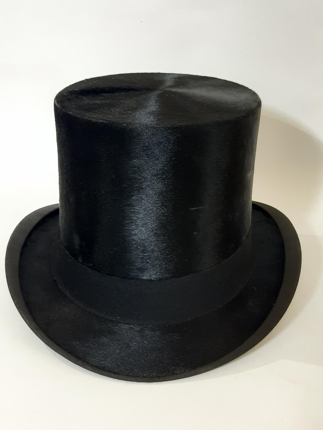 Early 20th century black silk top hat by G.A. Dunn & Co in silk lined stitched leather hat box. - Image 3 of 6