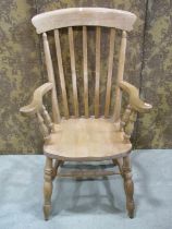 A Windsor lathe back elbow chair in beech wood