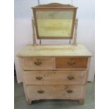 A small striped pine dressing chest of two long and two short drawers, with raised mirror back