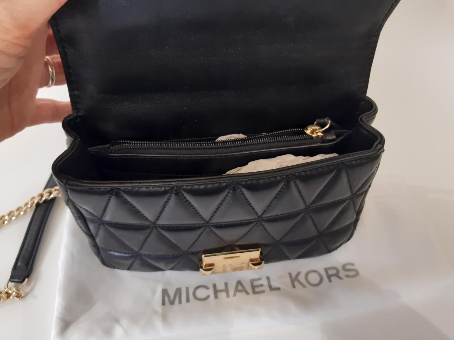 3 designer ladies hand bags comprising a small crossbody bag by Michael Kors in quilted black - Image 7 of 8