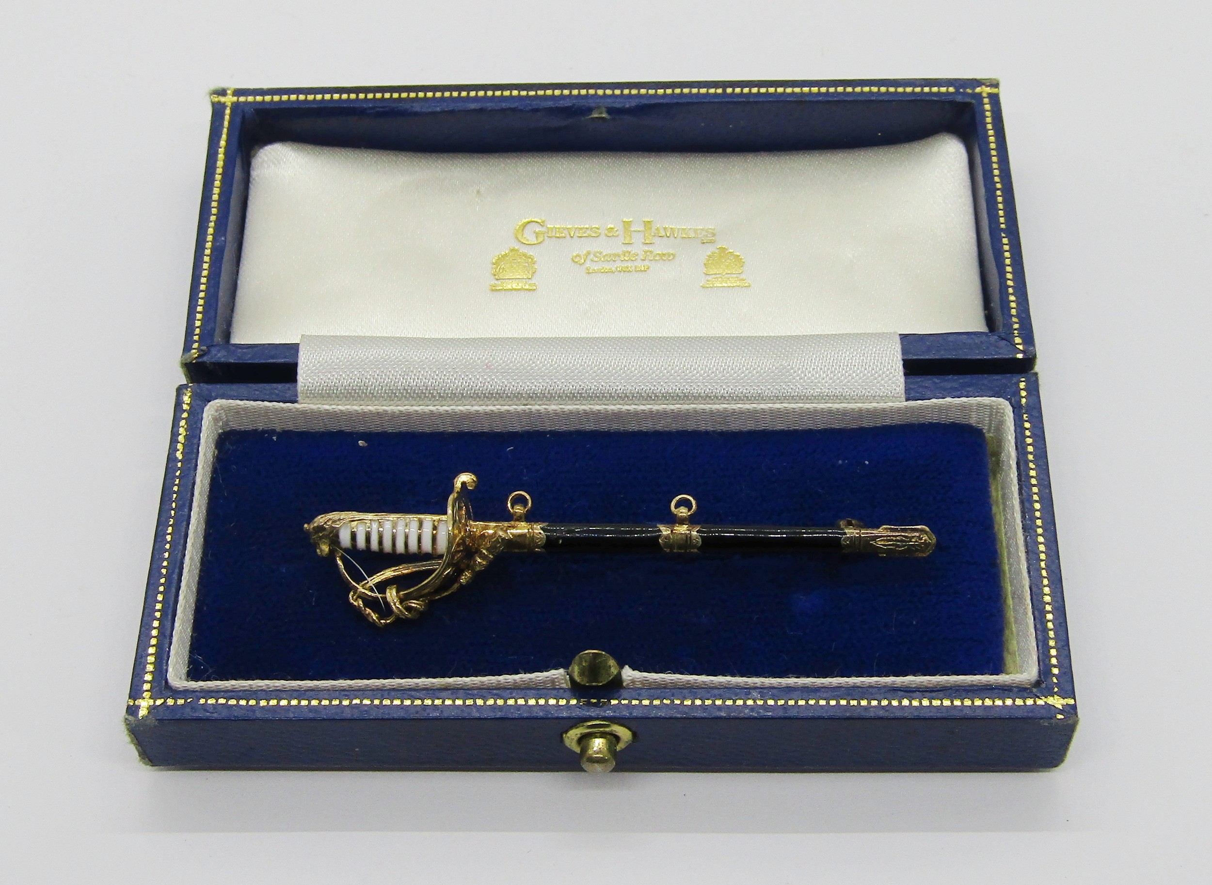 Silver gilt novelty Naval sword brooch, maker 'AMJ', London 1994, 6.3cm L approx, contained in a