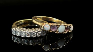 9ct diamond seven stone ring and a further 9ct opal and amethyst five stone ring, both size N, 5.