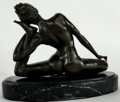 A bronze nude yoga lady on an oval marble base, signed MILO to the right thigh, 21cm wide x 16cm