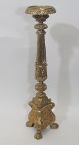 A large and impressive ecclesiastical Gothic cast gilt metal pricket candlestick, highly detailed