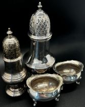 A Georgian style silver sugar castor, 15cm high, together with another smaller, 11cm high and a pair