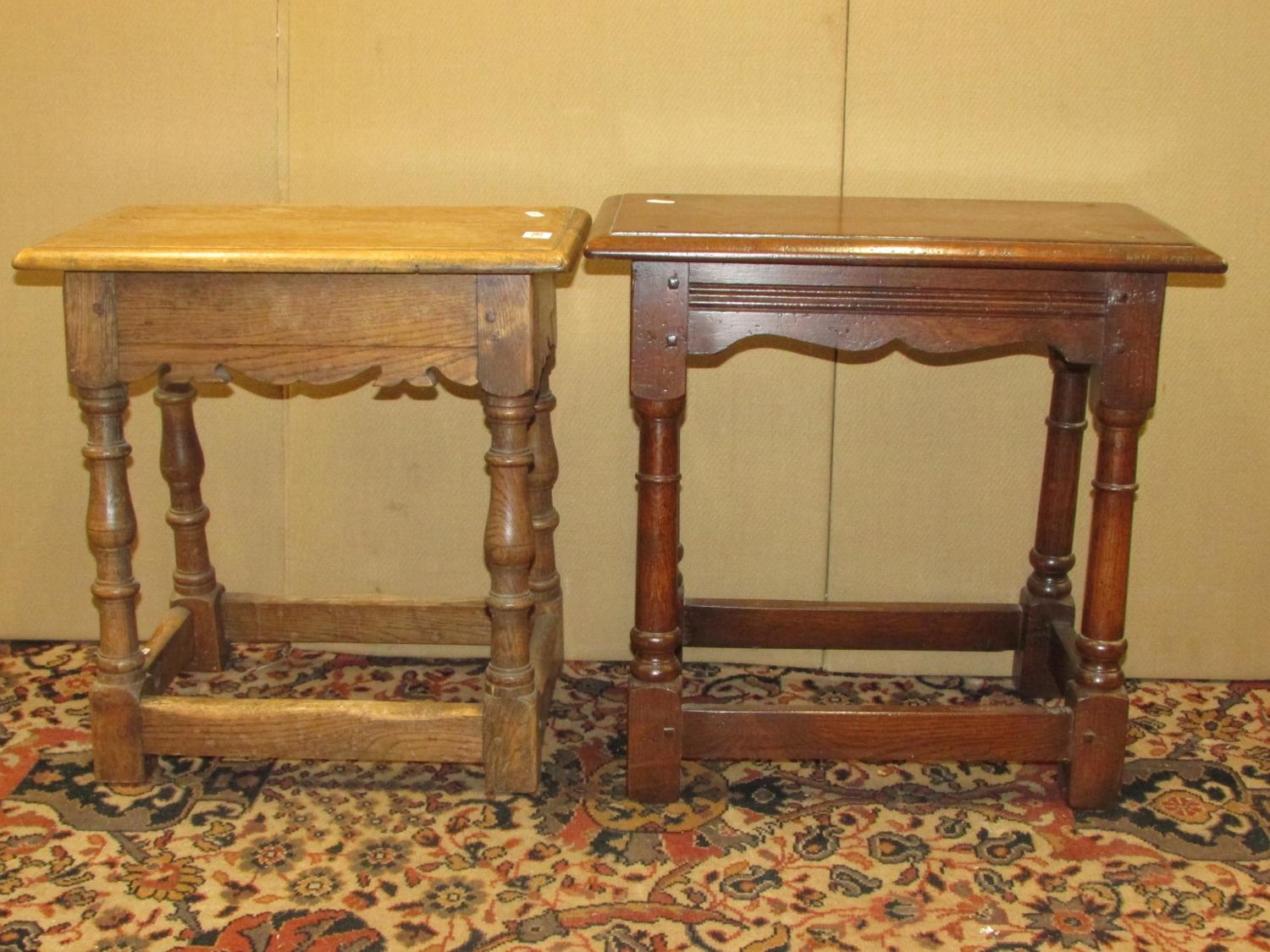 Two old English oak coffin or joint stools of traditional form (2)