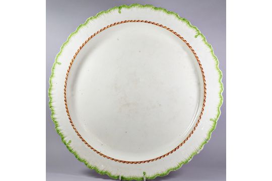 A large Leeds dish of circular form with hand painted and coloured borders, 1760-90, 43cm diameter - Image 1 of 2