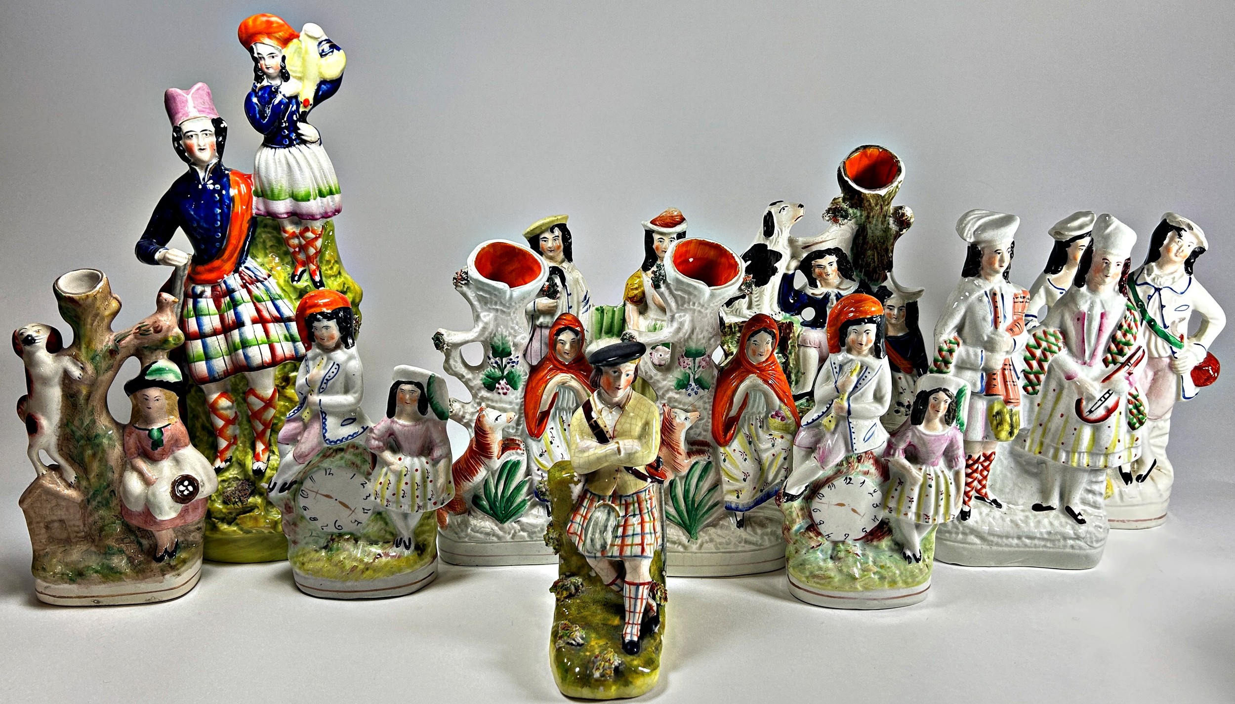 A collection of Staffordshire figures and figure groups