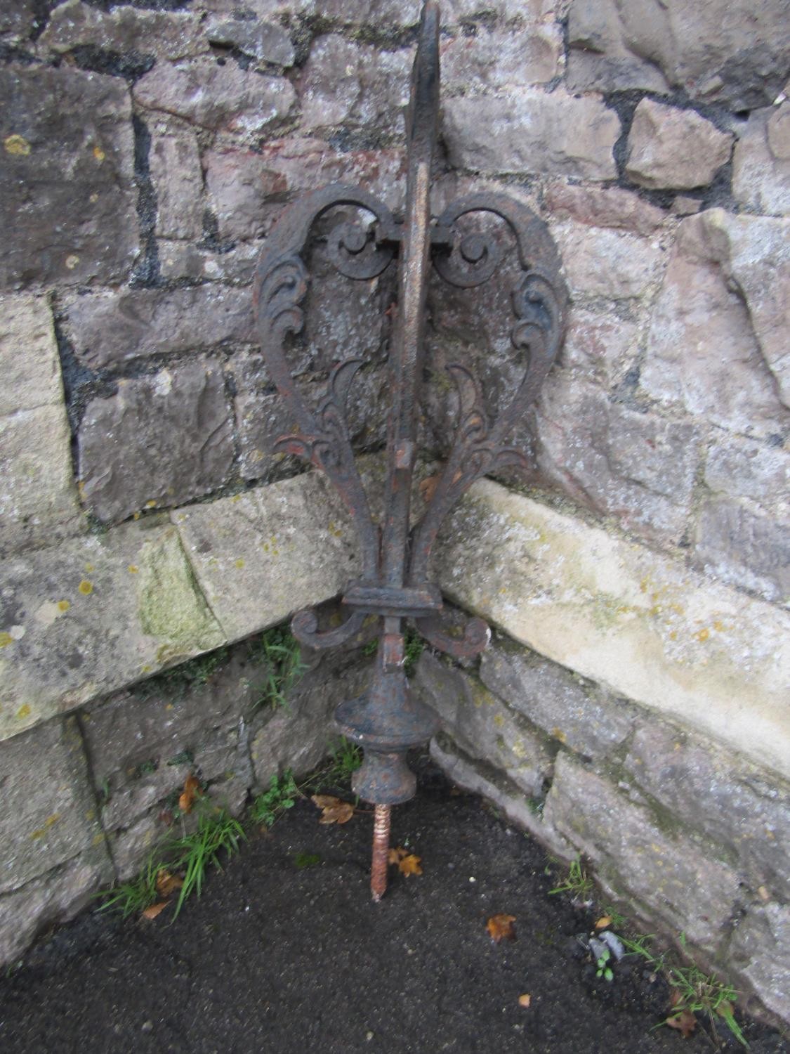 A 19th century cast iron architectural finial with open scrolling foliate detail, 98 cm high