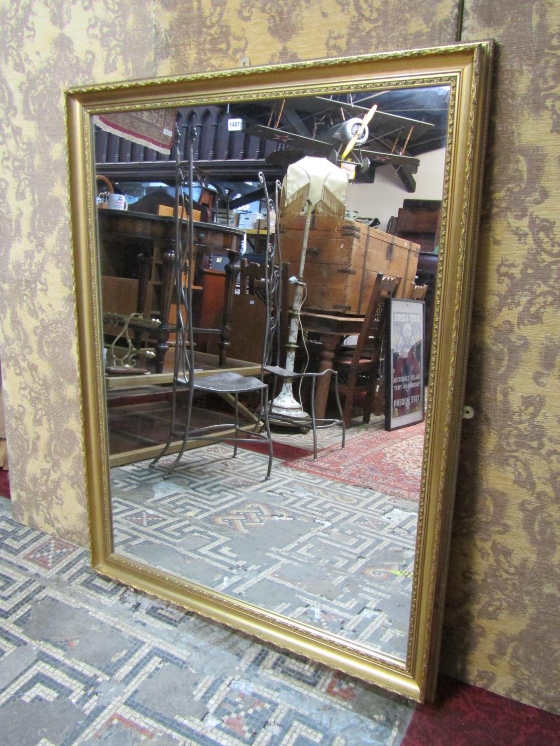 A large contemporary antique style rectangular wall mirror with stepped and moulded gilt frame 135