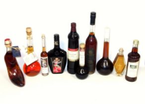 25 bottles of German liqueurs and spirits, some in souvenir/novelty bottles, flavours including