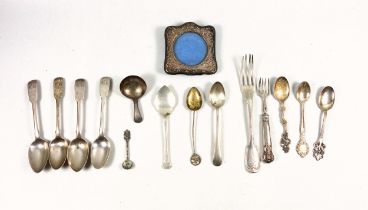 George III silver caddy spoon, by Thomas James, London, 1804; 4 Fiddle Pattern teaspoons, London,