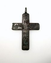 12th/13th century Byzantine bronze cross, unusual with a Greek inscription, possibly 'Jesus Christ