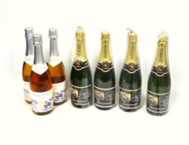 4 bottles of Jean Moureau Brut Champagne, each with 50th Anniversary of the Land Rover commemorative