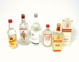 Bottle of Beefeater Gin, 1L, 47%; Sainsbury's Gin, 1.5L; 2 other bottles of gin, 70cl, and