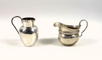 Victorian silver sparrow beak cream jug, by E G P, Birmingha, 1895, H.7.5cm, and another jug,