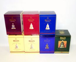 7 Bell's 8 Year Extra Special Old Scotch Whisky Christmas decanters by Wade, 1994, and 200-2005,