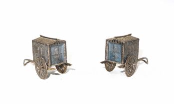 Novelty pair of Japanese silver salt and pepper pots in the form of carts, stamped "Sterling Japan",