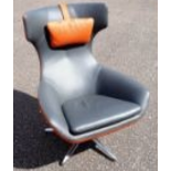 Leolux Caruzzo swivel armchair, designed by Hans Schrofer, launched 2015, custom made with orange