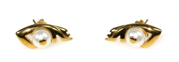 A pair of yellow metal pearl earrings by Kiara, stamped 750, 3.5 grams.