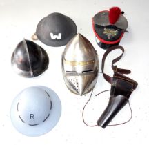 Medieval style steel helmet with pierced pointed hinged steel visor, W. 33cm, later steel helmet,
